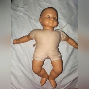 : An American Girl Bitty Baby Doll dark hair brown eyes read description